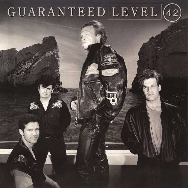 Level 42 - Guaranteed (180g) (Limited Numbered Edition) (Silver & Black Marbled Vinyl) -   - (Vinyl / Pop (Vinyl))